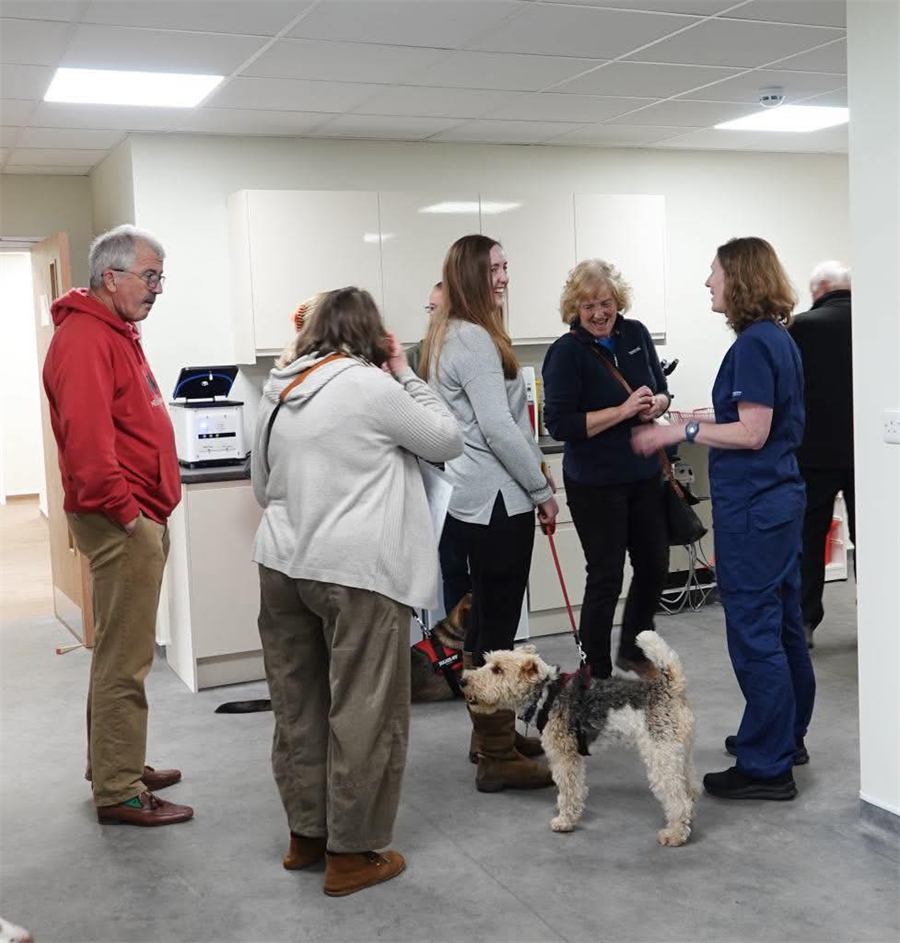 Open day visitors chatting with the team